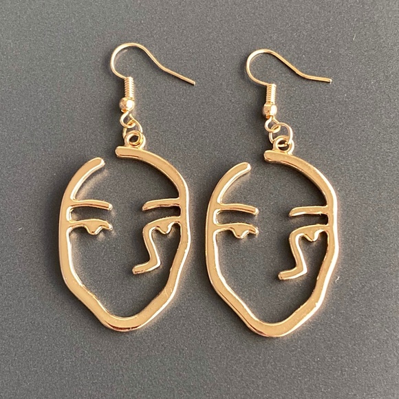 Jewelry - NEW Human Face Earrings in Gold color